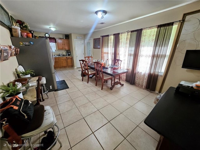 7073 Stonecreek Dr, Douglasville, GA 30134 - dining area with light tile patterned floors