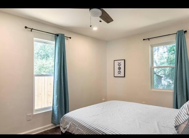 205 Maple St, Atlanta, GA 30354 - bedroom with baseboards and a ceiling fan