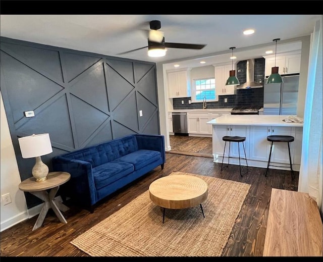 205 Maple St, Atlanta, GA 30354 - living room with ceiling fan and dark wood finished floors