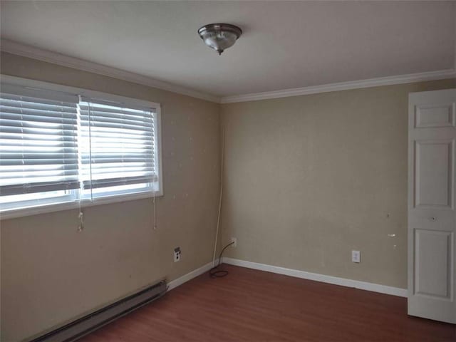 unfurnished room featuring crown molding, baseboard heating, and dark wood-type flooring