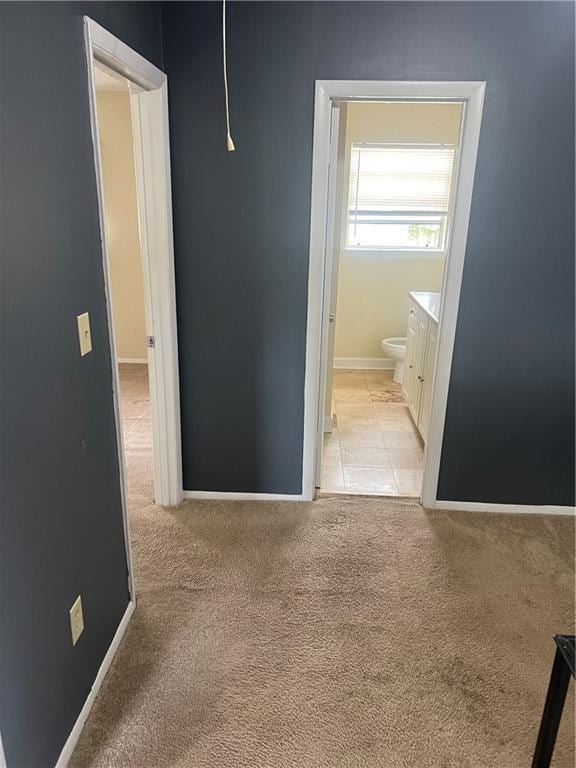 4701 Flat Shoals Rd Unit 65A, Union City, GA 30291 - corridor featuring light carpet and baseboards