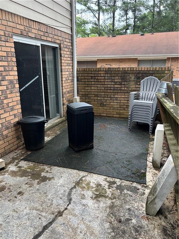 4701 Flat Shoals Rd Unit 65A, Union City, GA 30291 - view of patio / terrace featuring fence