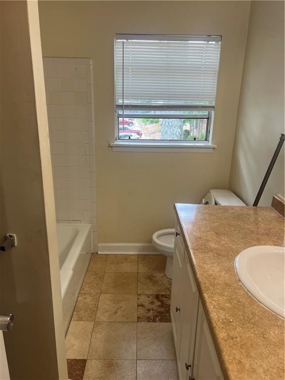4701 Flat Shoals Rd Unit 65A, Union City, GA 30291 - full bathroom featuring toilet, baseboards, vanity, a bath, and a shower