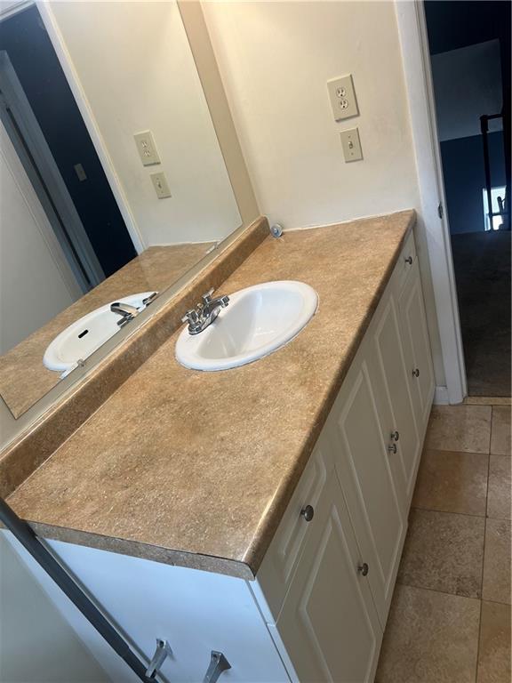 4701 Flat Shoals Rd Unit 65A, Union City, GA 30291 - bathroom featuring vanity and tile patterned floors