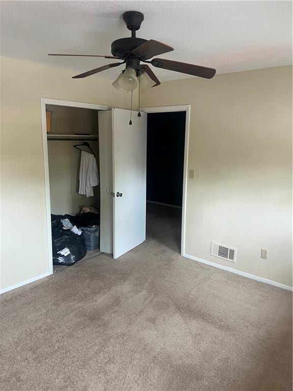 4701 Flat Shoals Rd Unit 65A, Union City, GA 30291 - unfurnished bedroom featuring carpet flooring, a closet, baseboards, and ceiling fan