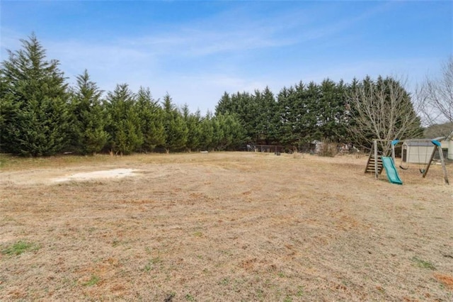 view of yard featuring a playground