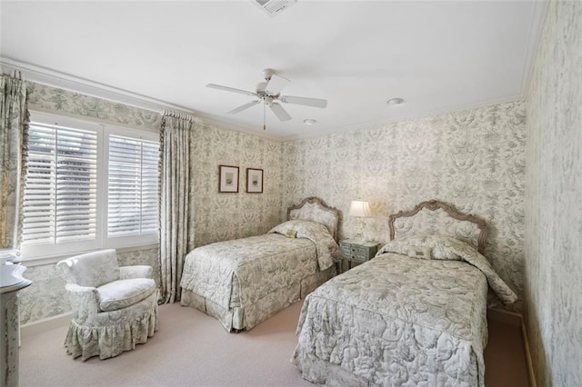 carpeted bedroom featuring ceiling fan and ornamental molding