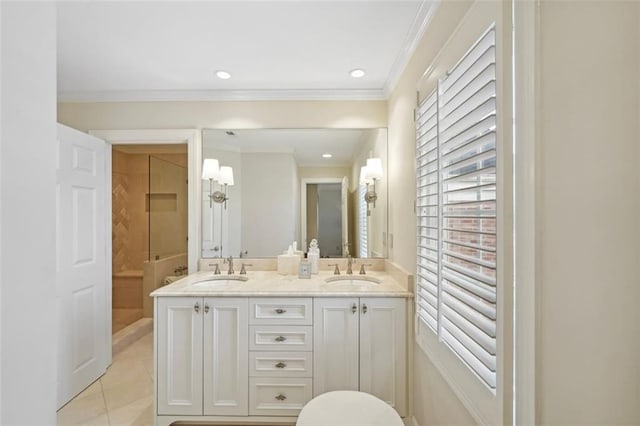 bathroom with ornamental molding, tile patterned flooring, and vanity