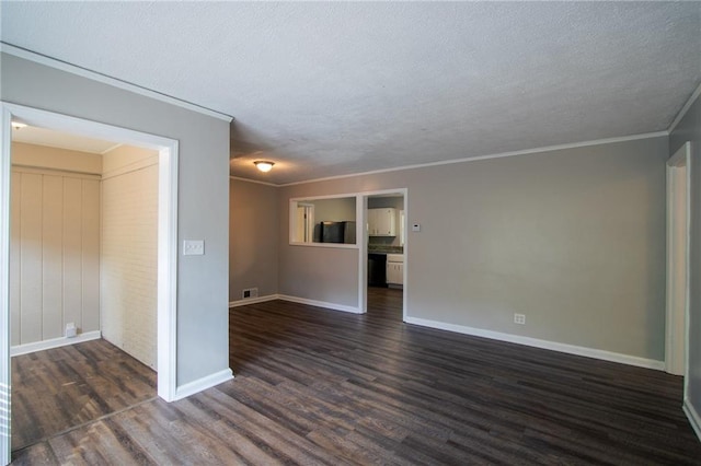 2308 Sheryl Dr, Decatur, GA 30032 - unfurnished room featuring dark wood finished floors, a textured ceiling, baseboards, and crown molding