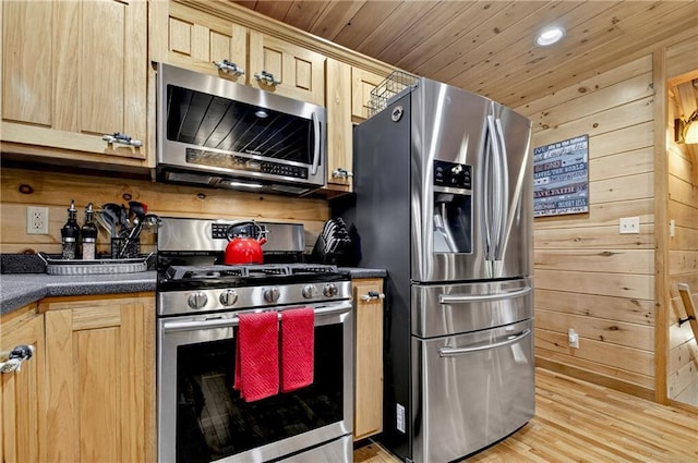 100 Black Oaks Rd, Cherry Log, GA 30522 - kitchen featuring stainless steel appliances, wooden walls, light brown cabinetry, dark countertops, and wood ceiling