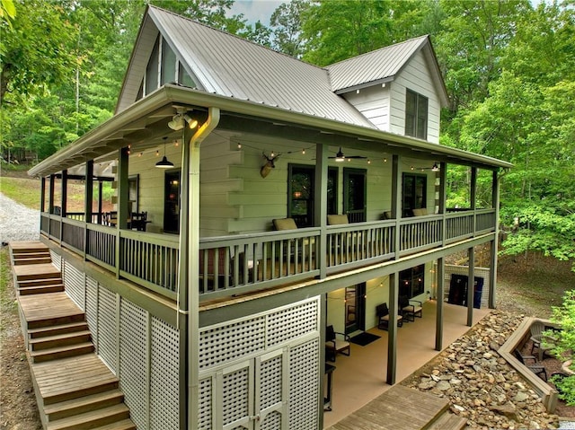 100 Black Oaks Rd, Cherry Log, GA 30522 - view of side of home featuring stairs, ceiling fan, a metal roof, a patio area, and a wooden deck