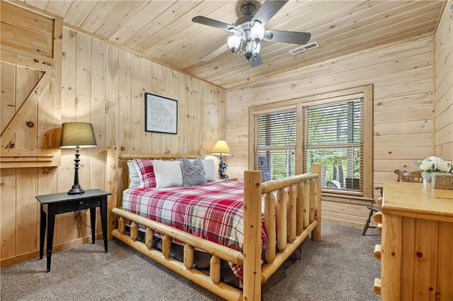 100 Black Oaks Rd, Cherry Log, GA 30522 - bedroom with wood ceiling, light carpet, and wooden walls