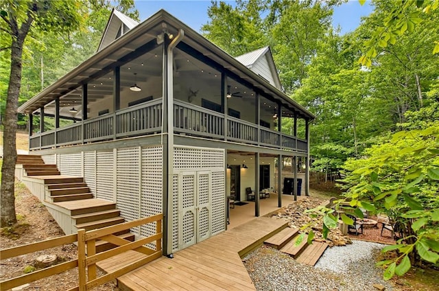100 Black Oaks Rd, Cherry Log, GA 30522 - back of house with a ceiling fan, stairs, a wooden deck, and a patio area