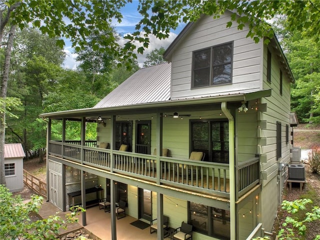 100 Black Oaks Rd, Cherry Log, GA 30522 - view of front of property featuring a metal roof, a wooden deck, and a patio