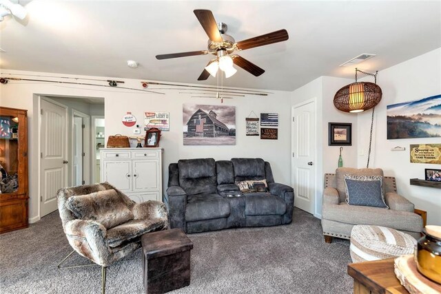 6628 Rivergreen Rd, Flowery Branch, GA 30542 - carpeted living room featuring a ceiling fan