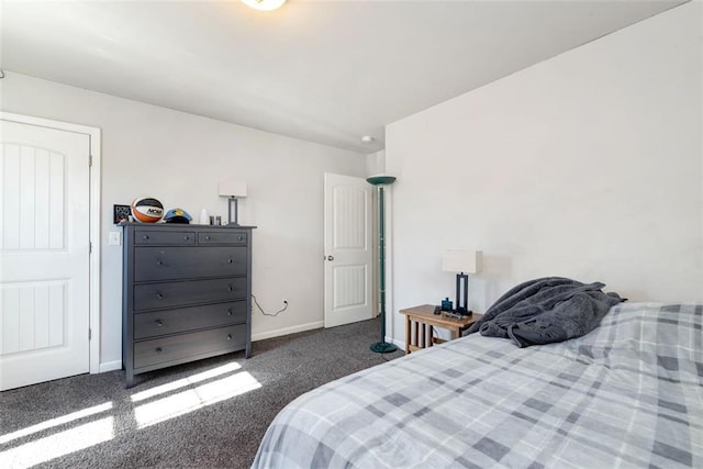 6628 Rivergreen Rd, Flowery Branch, GA 30542 - carpeted bedroom featuring baseboards
