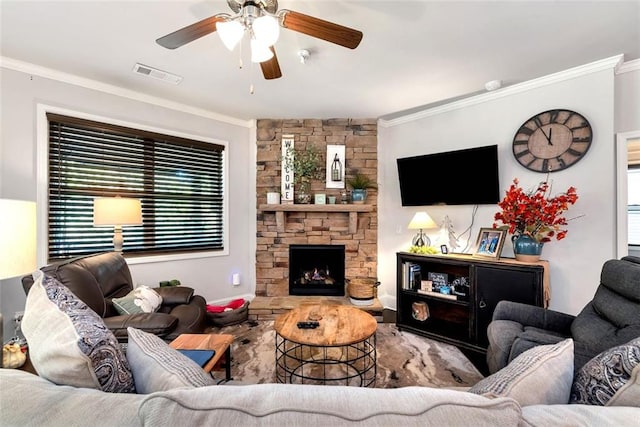 6628 Rivergreen Rd, Flowery Branch, GA 30542 - living area featuring crown molding, a ceiling fan, a fireplace, and baseboards