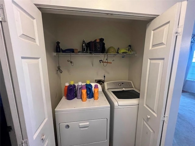 washroom with washer and clothes dryer