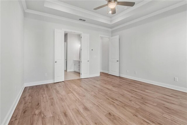 unfurnished living room featuring dark hardwood / wood-style flooring, ceiling fan, a fireplace, and ornamental molding