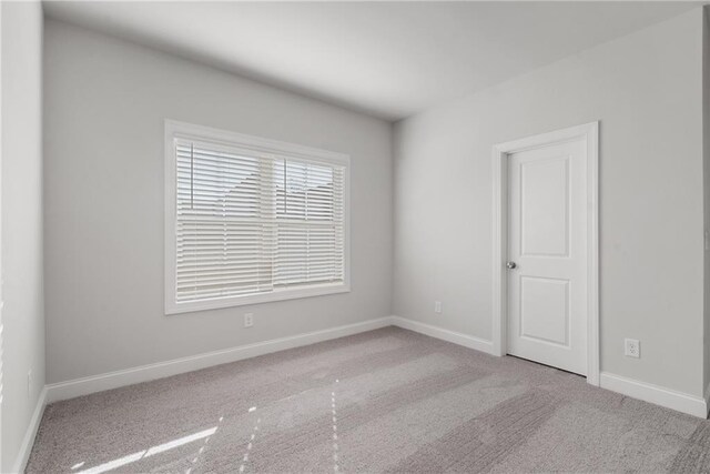 bathroom with tile patterned flooring, vanity, an enclosed shower, and toilet