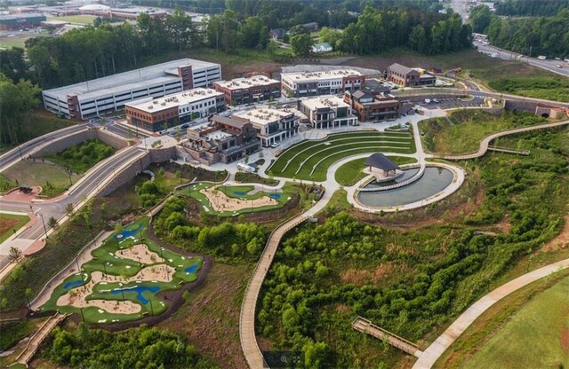 birds eye view of property with a mountain view