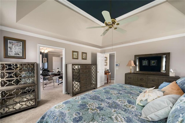 bedroom featuring light carpet, ornamental molding, a raised ceiling, and a ceiling fan