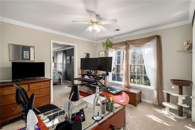 home office featuring light carpet, plenty of natural light, and visible vents