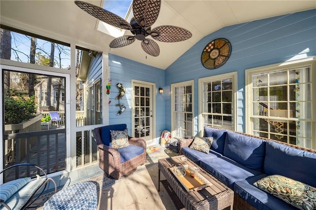 sunroom / solarium with vaulted ceiling and ceiling fan