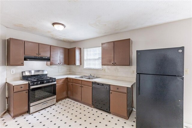 kitchen with light wood-style flooring, white cabinetry, baseboards, and freestanding refrigerator