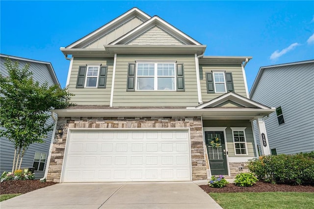 103 Waterside Dr, Calhoun, GA 30701 - view of front of property featuring stone siding, a front lawn, an attached garage, and concrete driveway