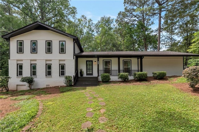 3480 Tanbark Ct NE, Brookhaven, GA 30319 - tri-level home with covered porch, a front yard, and brick siding