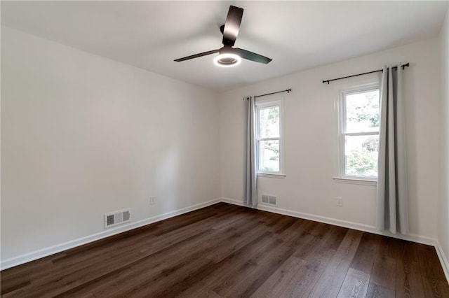 3480 Tanbark Ct NE, Brookhaven, GA 30319 - spare room with dark wood-style flooring and ceiling fan