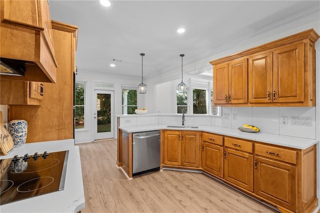 kitchen with crown molding, black electric stovetop, a sink, light wood finished floors, and stainless steel dishwasher
