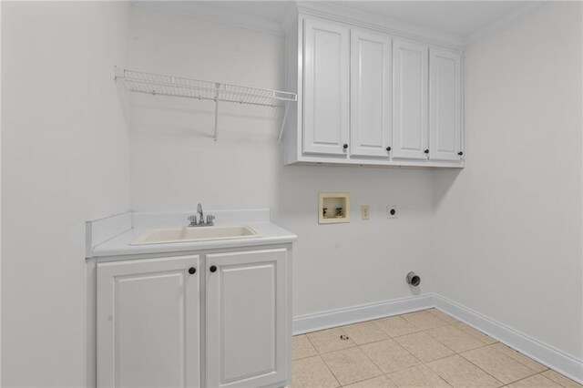 laundry area featuring washer hookup, electric dryer hookup, cabinet space, a sink, and baseboards