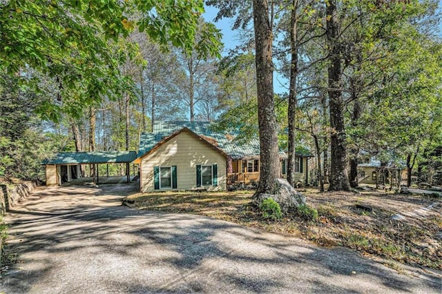 exterior space featuring a carport