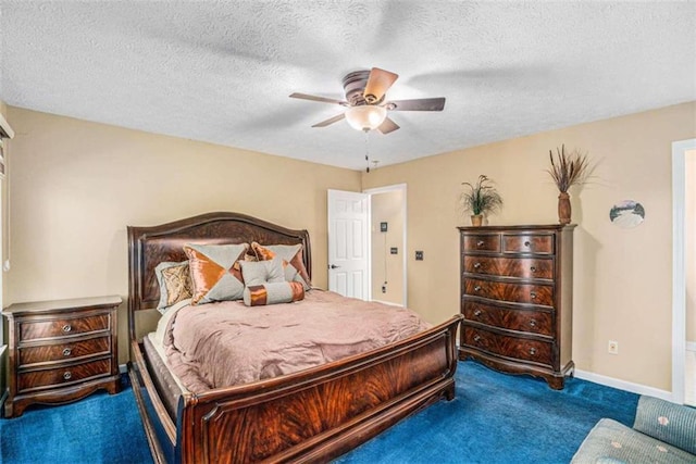 bedroom with a textured ceiling, ceiling fan, and carpet