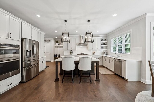 107 Equest Dr, Canton, GA 30115 - kitchen with stainless steel appliances, open shelves, a kitchen breakfast bar, a center island, and backsplash
