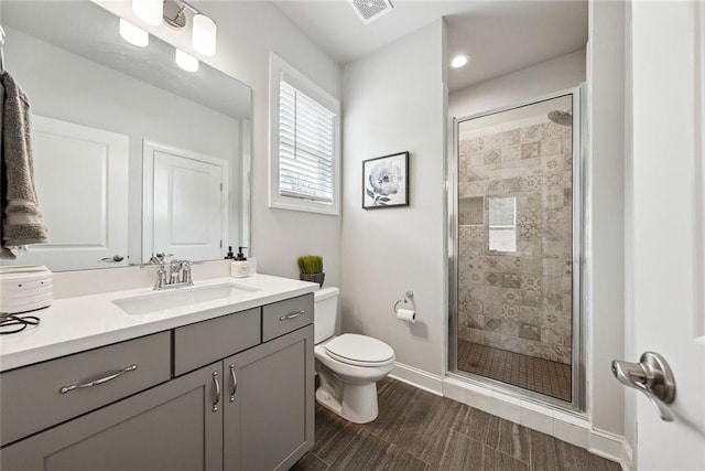 107 Equest Dr, Canton, GA 30115 - full bathroom featuring vanity, a stall shower, and wood finished floors