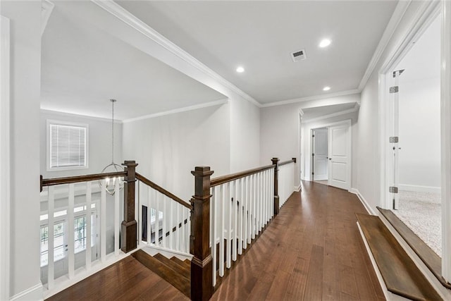 107 Equest Dr, Canton, GA 30115 - hallway with an upstairs landing, a chandelier, recessed lighting, wood finished floors, and crown molding