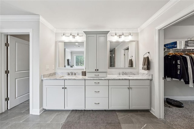107 Equest Dr, Canton, GA 30115 - bathroom with double vanity, ornamental molding, and a walk in closet