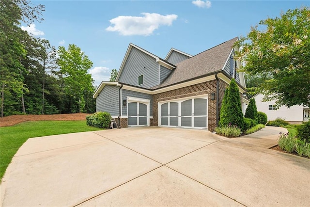107 Equest Dr, Canton, GA 30115 - view of property exterior with brick siding, a garage, concrete driveway, and a lawn