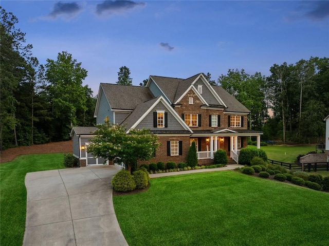 107 Equest Dr, Canton, GA 30115 - view of front of property with driveway, a porch, a front lawn, brick siding, and an attached garage
