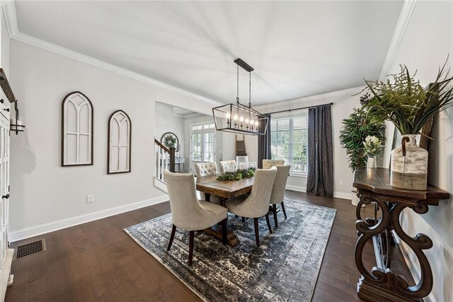 107 Equest Dr, Canton, GA 30115 - dining space with crown molding, dark wood finished floors, and a chandelier