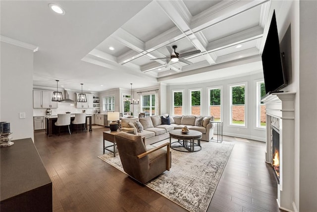 107 Equest Dr, Canton, GA 30115 - living area with ceiling fan, beamed ceiling, recessed lighting, a warm lit fireplace, and dark wood finished floors