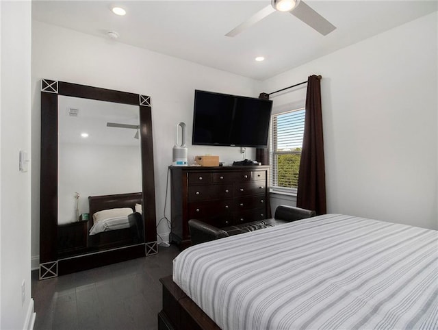 bedroom featuring dark hardwood / wood-style floors and ceiling fan