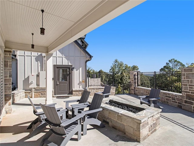 view of patio featuring a fire pit