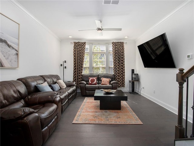 living room with crown molding, dark hardwood / wood-style flooring, and ceiling fan