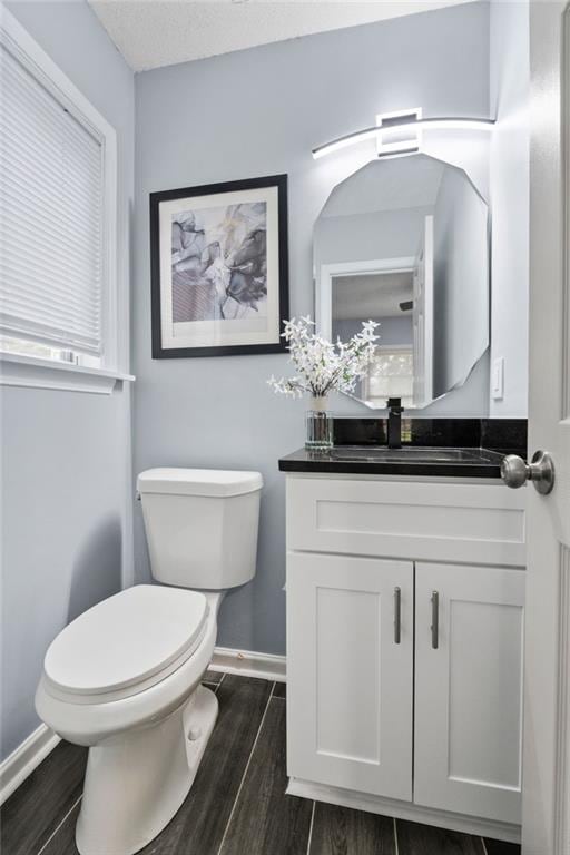 1694 Pheasant Dr, Atlanta, GA 30238 - bathroom featuring vanity and wood finished floors