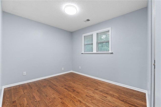 1694 Pheasant Dr, Atlanta, GA 30238 - empty room featuring dark wood-type flooring and baseboards