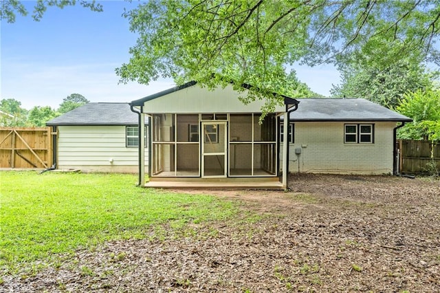 1694 Pheasant Dr, Atlanta, GA 30238 - rear view of property with a sunroom and brick siding